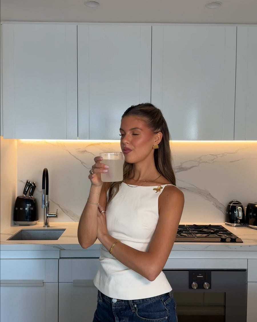 Ella drinking UNFLTRD.